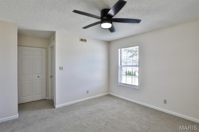 160 Jubilee Hill Dr Unit G, Grover, MO 63040 - carpeted spare room with a textured ceiling and ceiling fan