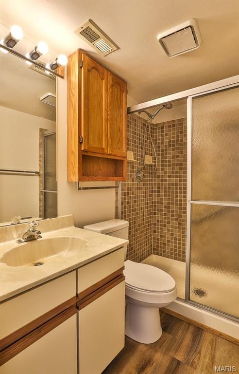 160 Jubilee Hill Dr Unit G, Grover, MO 63040 - full bathroom with wood finished floors, a shower stall, and vanity