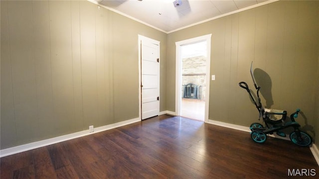 18937 Wayne Route D, Wappapello, MO 63966 - empty room with dark wood-style floors and crown molding