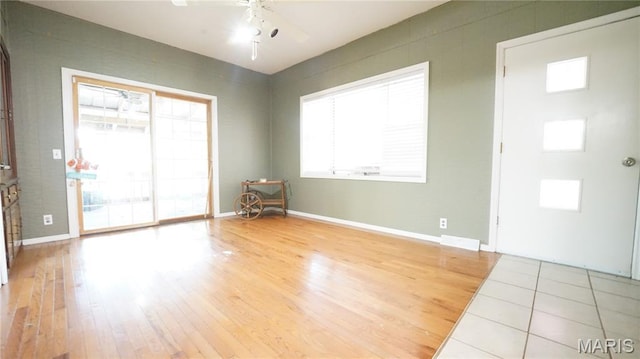 18937 Wayne Route D, Wappapello, MO 63966 - unfurnished room with light wood finished floors and a ceiling fan