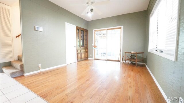 18937 Wayne Route D, Wappapello, MO 63966 - foyer entrance featuring stairs, light wood-style flooring, plenty of natural light, and ceiling fan
