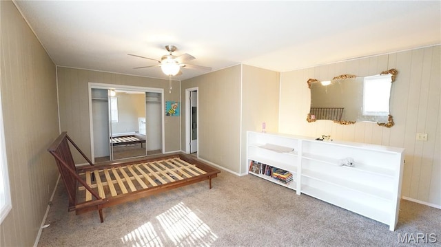 18937 Wayne Route D, Wappapello, MO 63966 - living area with carpet flooring, ceiling fan, and wooden walls