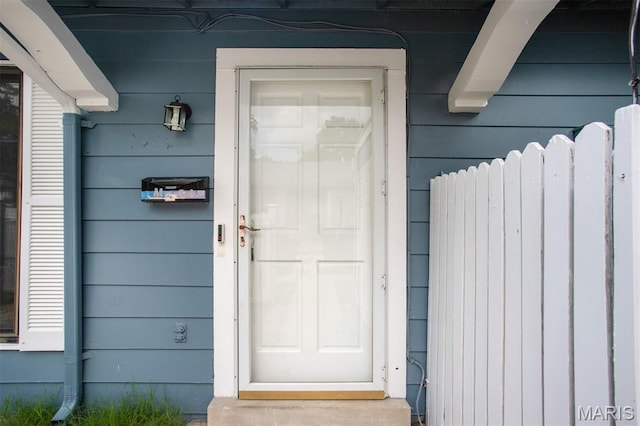 2449 Forest Shadows Dr, Saint Louis, MO 63136 - doorway to property featuring radiator