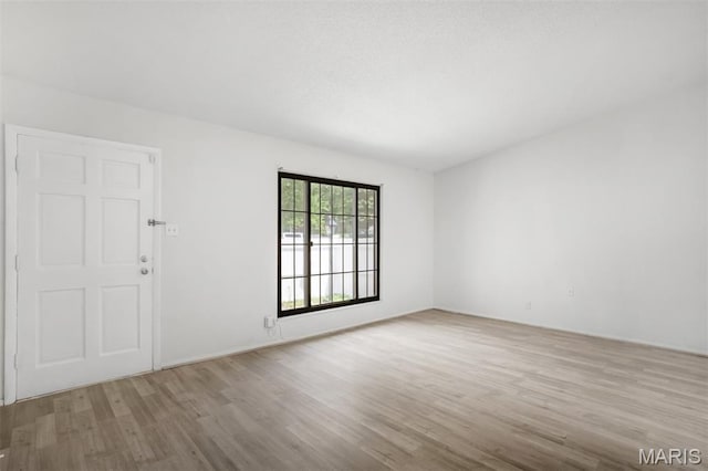 2449 Forest Shadows Dr, Saint Louis, MO 63136 - unfurnished room with wood finished floors