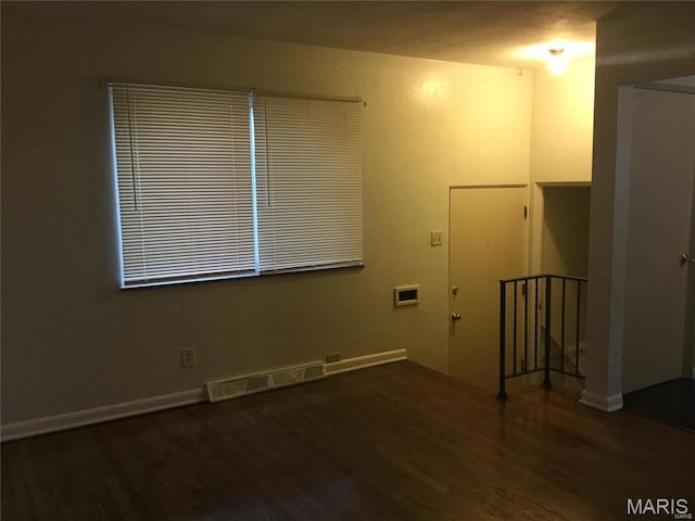 8552 Church Rd, Saint Louis, MO 63147 - empty room with wood finished floors and baseboards