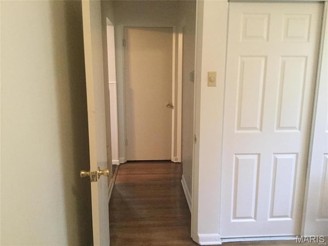 8552 Church Rd, Saint Louis, MO 63147 - corridor with dark wood finished floors and baseboards