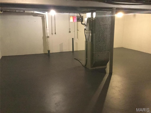 8552 Church Rd, Saint Louis, MO 63147 - unfinished basement featuring heating unit