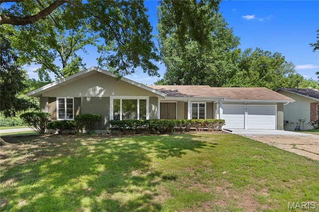 1618 Clock Tower Dr, Saint Louis, MO 63138 - ranch-style house featuring an attached garage, a front yard, driveway, and brick siding
