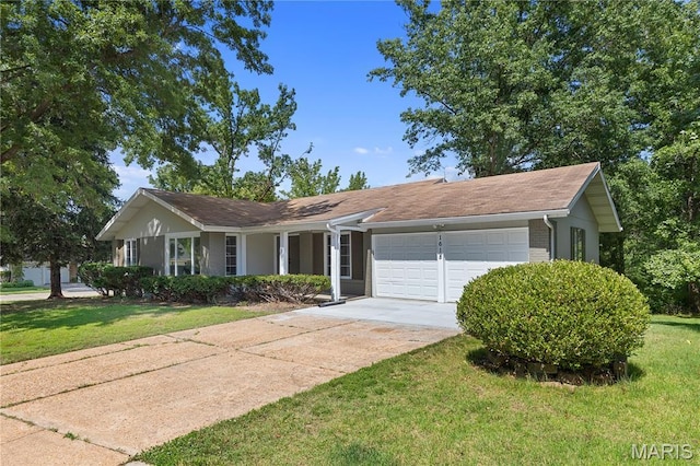 1618 Clock Tower Dr, Saint Louis, MO 63138 - ranch-style home with a garage, a front lawn, and driveway