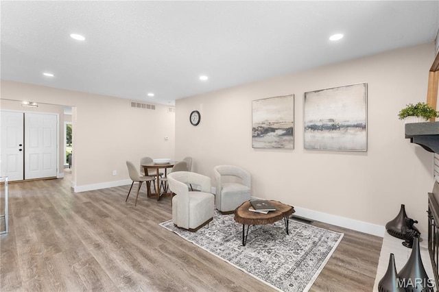 1618 Clock Tower Dr, Saint Louis, MO 63138 - living area featuring recessed lighting and wood finished floors