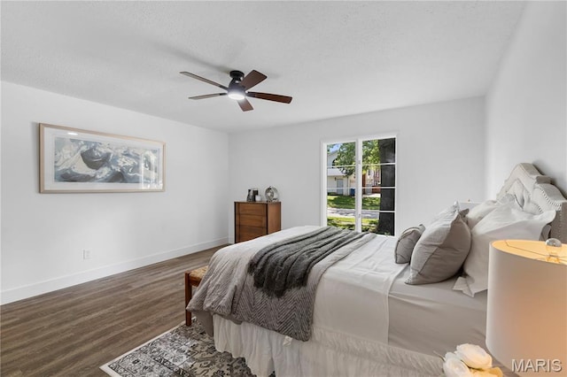 1618 Clock Tower Dr, Saint Louis, MO 63138 - bedroom with wood finished floors, a ceiling fan, and a textured ceiling