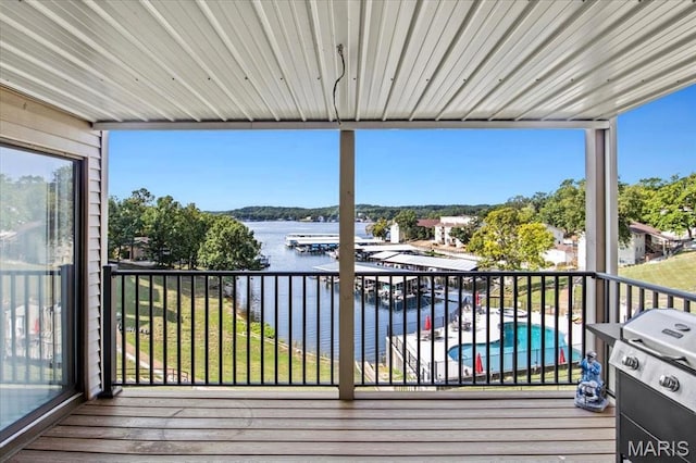 40 Robinwood Unit 2C, Lake Ozark, MO 65049 - wooden deck with grilling area and a water view