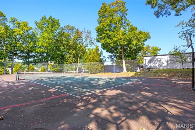 40 Robinwood Unit 2C, Lake Ozark, MO 65049 - view of tennis court featuring community basketball court