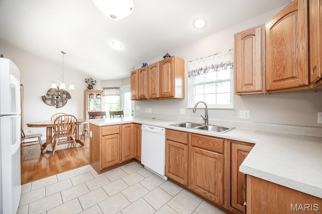 132 Timberlake, Damiansville, IL 62215 - kitchen featuring white appliances, a peninsula, healthy amount of natural light, light countertops, and recessed lighting