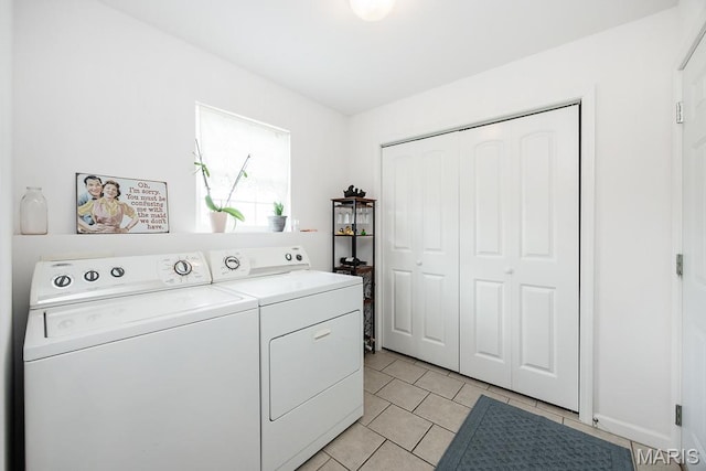 132 Timberlake, Damiansville, IL 62215 - washroom with washing machine and dryer and light tile patterned floors