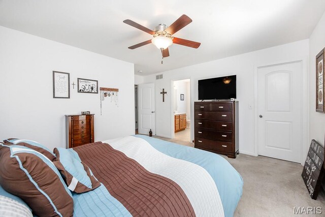 132 Timberlake, Damiansville, IL 62215 - bedroom with light colored carpet, ceiling fan, and connected bathroom