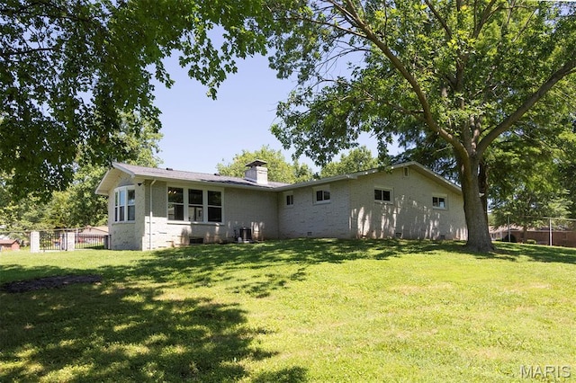 5 Lakeshore Dr, New Baden, IL 62265 - rear view of house featuring brick siding, a chimney, and crawl space
