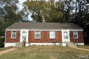 9427 Bataan Dr Unit 2, Woodson Terrace, MO 63134 - ranch-style home featuring a front lawn and brick siding