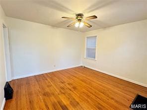 9427 Bataan Dr Unit 2, Woodson Terrace, MO 63134 - unfurnished room with a ceiling fan and wood finished floors