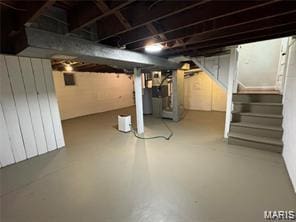 9427 Bataan Dr Unit 2, Woodson Terrace, MO 63134 - unfinished below grade area featuring stairway and heating unit