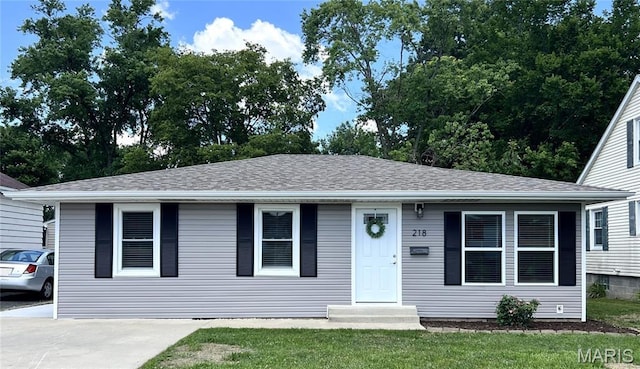 218 Mill St, Bethalto, IL 62010 - view of front facade featuring a front yard