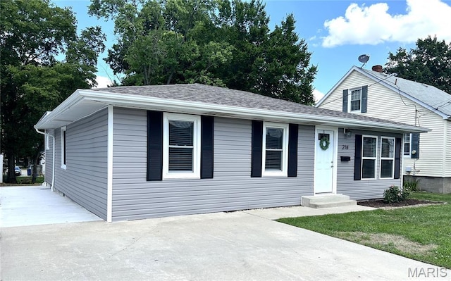218 Mill St, Bethalto, IL 62010 - view of front facade featuring a shingled roof