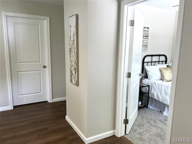 218 Mill St, Bethalto, IL 62010 - hall featuring dark wood-style flooring and baseboards