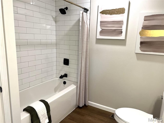 218 Mill St, Bethalto, IL 62010 - bathroom featuring shower / bathtub combination with curtain and wood finished floors