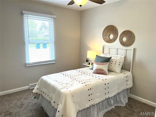 218 Mill St, Bethalto, IL 62010 - carpeted bedroom with multiple windows and ceiling fan