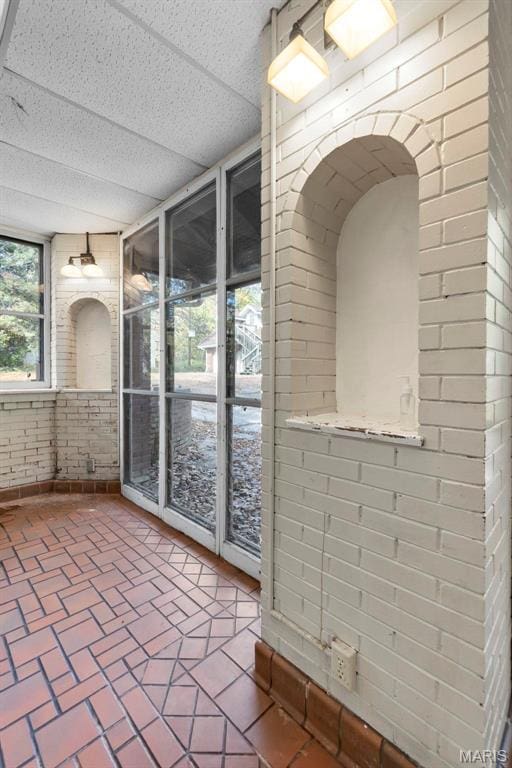 325 N Spring St, Cape Girardeau, MO 63701 - unfurnished sunroom with arched walkways