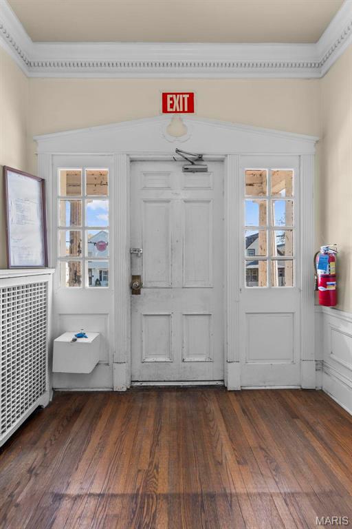 325 N Spring St, Cape Girardeau, MO 63701 - entryway with wood finished floors and crown molding