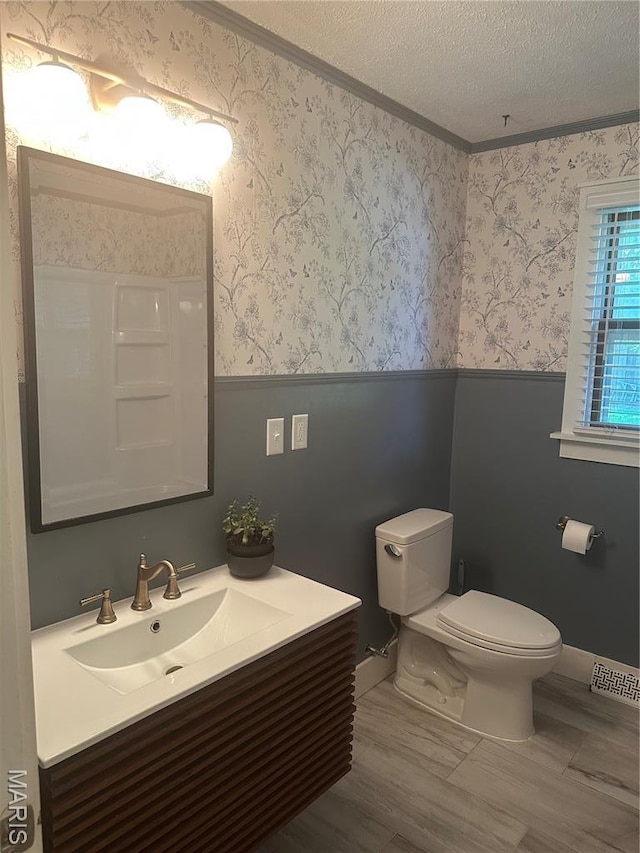 6378 High St, Moro, IL 62067 - bathroom with a wainscoted wall, vanity, a textured ceiling, wallpapered walls, and ornamental molding