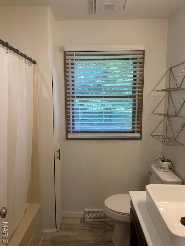 6378 High St, Moro, IL 62067 - bathroom featuring vanity and shower / bath combo with shower curtain
