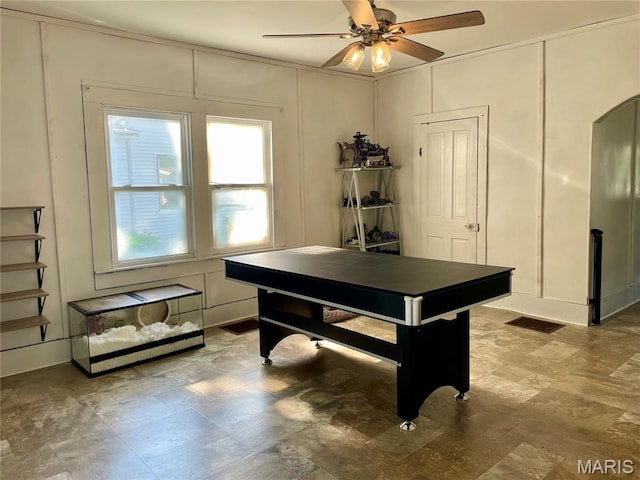 204 E Columbia St, Litchfield, IL 62056 - rec room with a decorative wall, plenty of natural light, and a ceiling fan