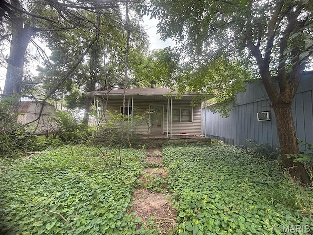 1406 Rhodes St, Granite City, IL 62040 - back of house featuring covered porch