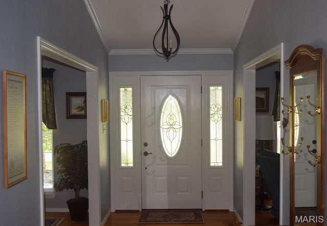 1741 Ivy Chase Ct, Fenton, MO 63026 - foyer entrance featuring ornamental molding and wood finished floors