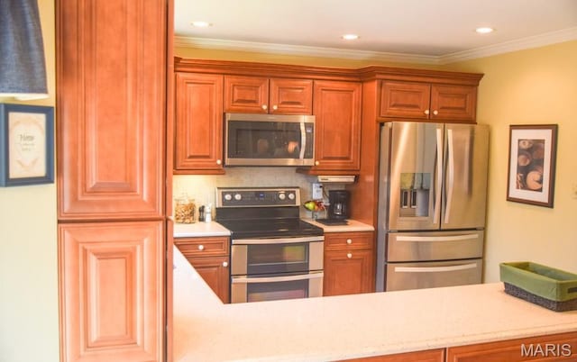 1741 Ivy Chase Ct, Fenton, MO 63026 - kitchen featuring stainless steel appliances, ornamental molding, backsplash, and recessed lighting