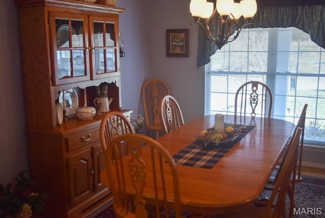 1741 Ivy Chase Ct, Fenton, MO 63026 - dining area with a chandelier