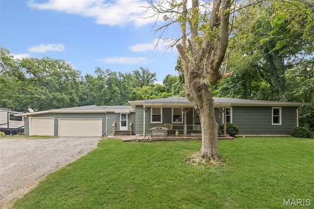 1752 N Bluff Rd, Collinsville, IL 62234 - ranch-style house featuring driveway, a front lawn, and a garage