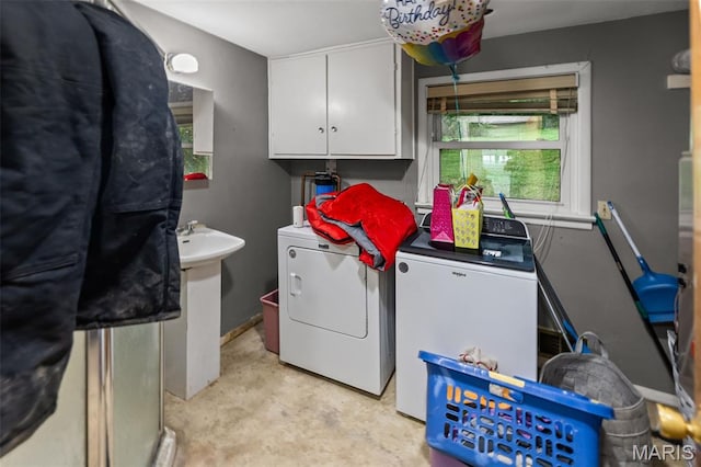 1752 N Bluff Rd, Collinsville, IL 62234 - laundry room with washing machine and dryer and cabinet space