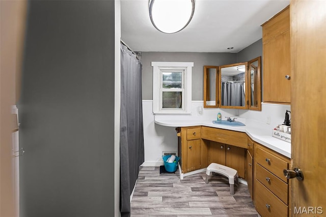 1752 N Bluff Rd, Collinsville, IL 62234 - full bath with vanity, wood finished floors, and curtained shower