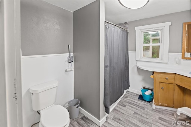 1752 N Bluff Rd, Collinsville, IL 62234 - full bathroom featuring vanity, wood finished floors, and a shower with shower curtain