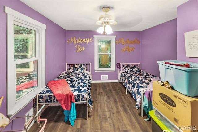 1752 N Bluff Rd, Collinsville, IL 62234 - bedroom with multiple windows and wood finished floors