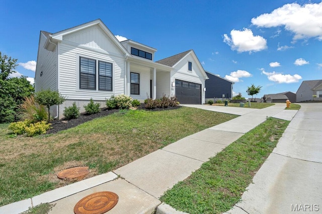 845 Kingston Hills Ct, Fenton, MO 63026 - view of front of property featuring a front yard, concrete driveway, board and batten siding, and a garage