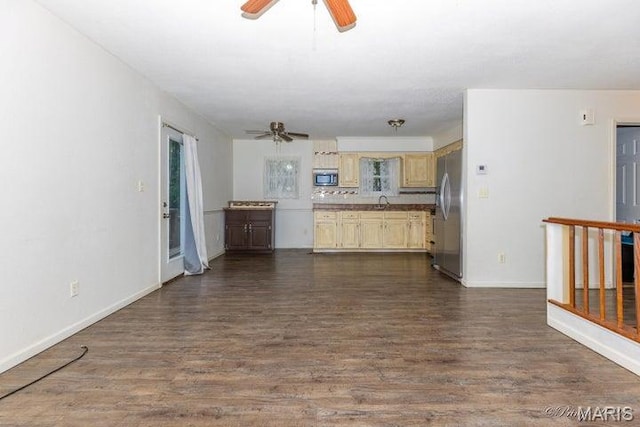 916 Kansas St, Mountain View, MO 65548 - unfurnished living room with ceiling fan and dark wood-style floors