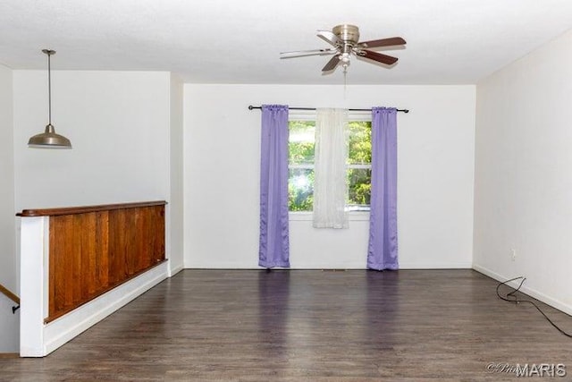916 Kansas St, Mountain View, MO 65548 - unfurnished room with wood finished floors and a ceiling fan