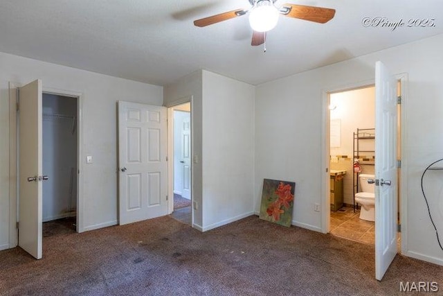916 Kansas St, Mountain View, MO 65548 - unfurnished bedroom featuring carpet floors, ensuite bath, and a ceiling fan