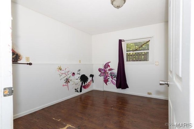 916 Kansas St, Mountain View, MO 65548 - spare room with wood finished floors and baseboards