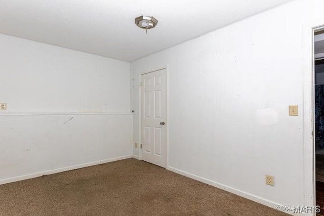 916 Kansas St, Mountain View, MO 65548 - empty room featuring carpet flooring and baseboards