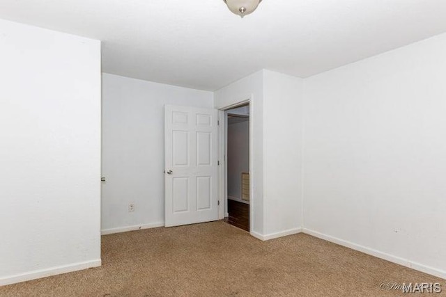 916 Kansas St, Mountain View, MO 65548 - unfurnished bedroom featuring carpet and baseboards